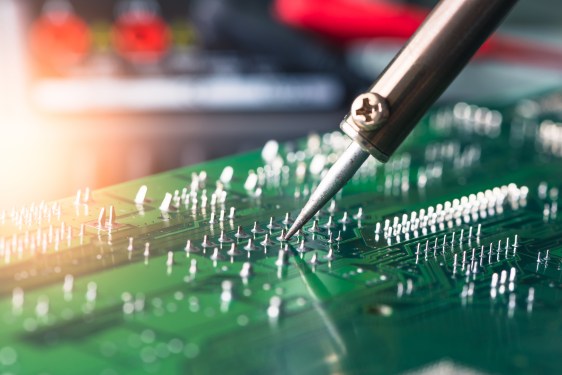 soldering a computer circuit board