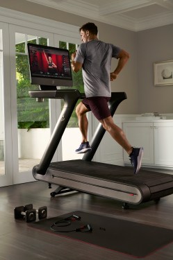 man running on a Peloton Tread Lifestyle 03