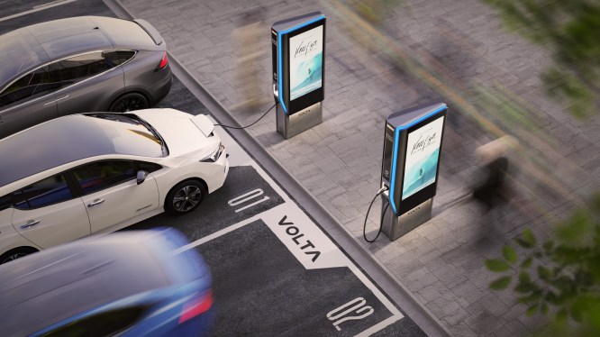 volta lifestyle A; electric vehicles at a charging station.