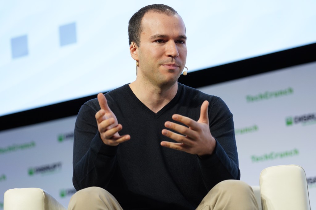 Greg Brockman onstage at TechCrunch Disrupt 2019