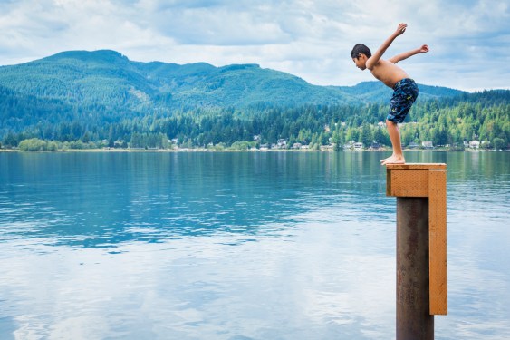 boy jump lake dive