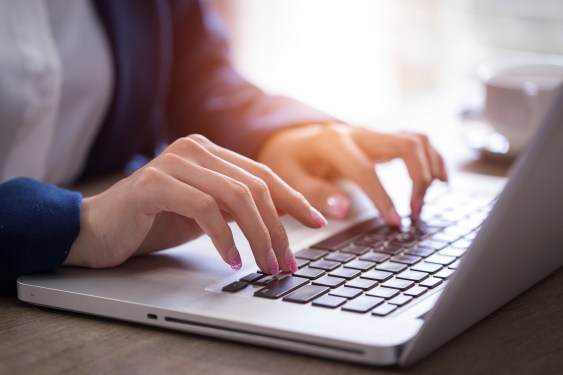 woman writing typing
