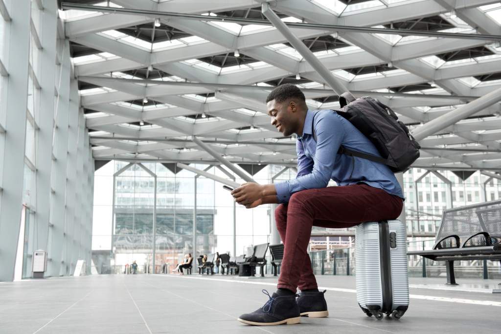 suitcase traveler nomad airport