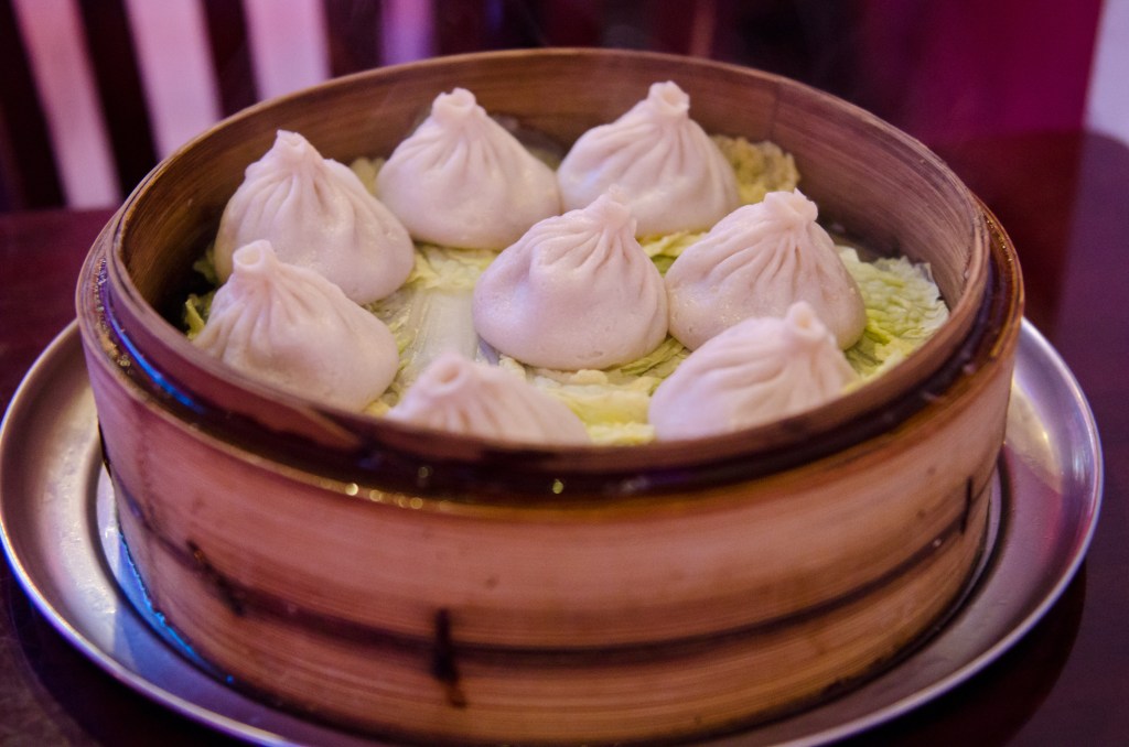 Shanghai style soup dumplings served steamed in restaurant in Chinatown.