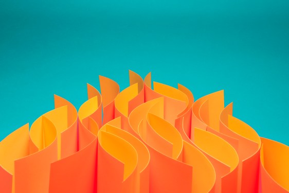 Waves of sheets of paper that mimic fire