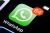 WhatsApp icon on a phone screen