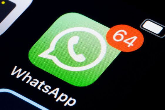 WhatsApp icon on a phone screen