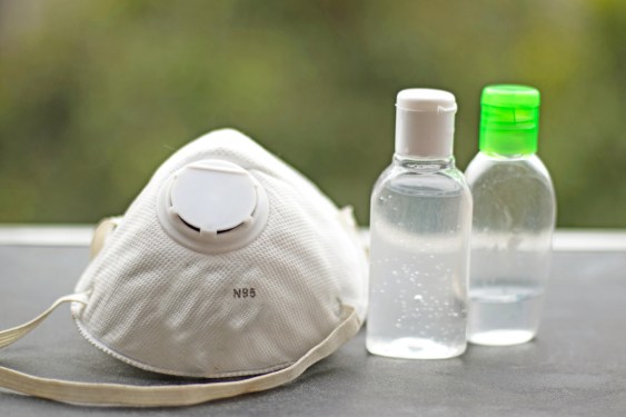 N95 face mask and hand sanitizer displayed