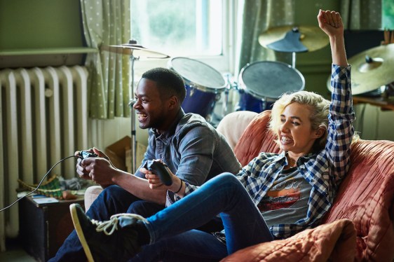 Friends play a games console