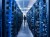 Woman standing in aisle of server room