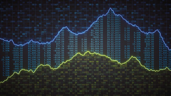 A front view on multiple spreadsheets containing binary computer data, financial figures and graph lines.