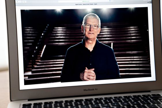 Tim Cook, chief executive officer of Apple Inc., speaks during the Apple Worldwide Developers Conference seen on a laptop computer in Arlington, Virginia, U.S., on Monday, June 22, 2020. Apple will walk into its annual development conference facing one of the biggest backlashes from its giant community of creators since the App Store started almost 12 years ago. Photographer: Andrew Harrer/Bloomberg via Getty Images