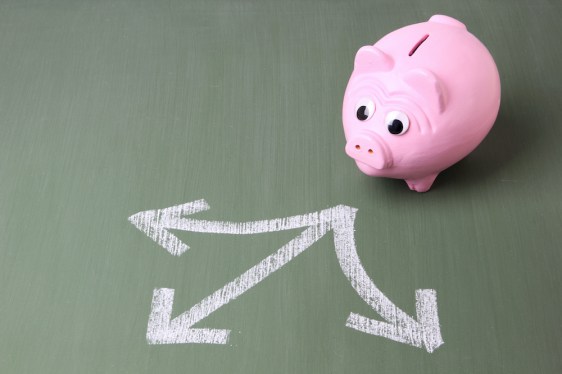 Pink piggy bank standing in front of three arrows showing different directionsSome other related images: