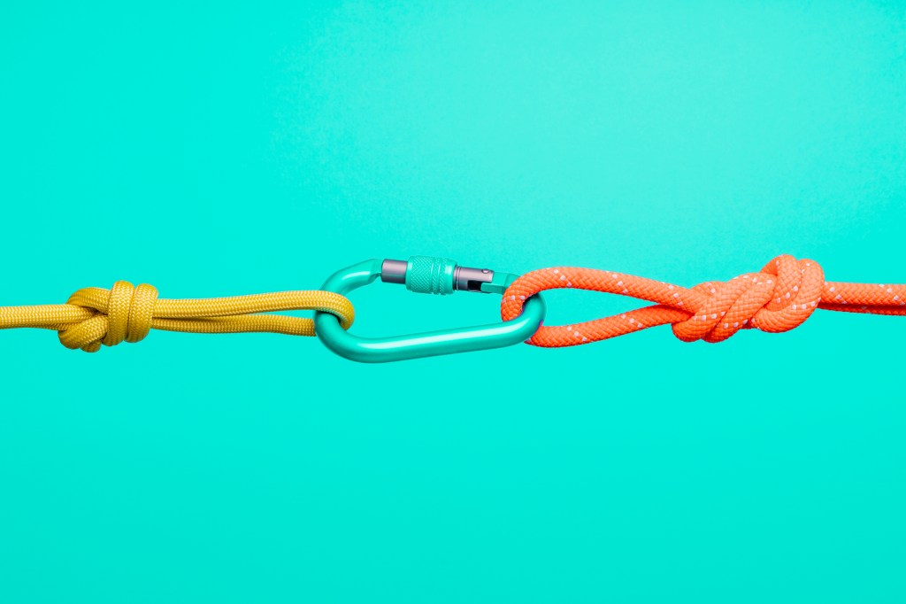 climbing ropes connected by carabiner
