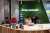 Signage for Atlassian Corp. is displayed in the enterprise software company's Global R&D Center in Bengaluru, India, on Wednesday, July 3, 2019. Atlassian Co-founder and Chief Executive Officer Cannon-Brookes has said the firm will get all its power from renewable sources by 2025. Photographer: Karen Dias/Bloomberg