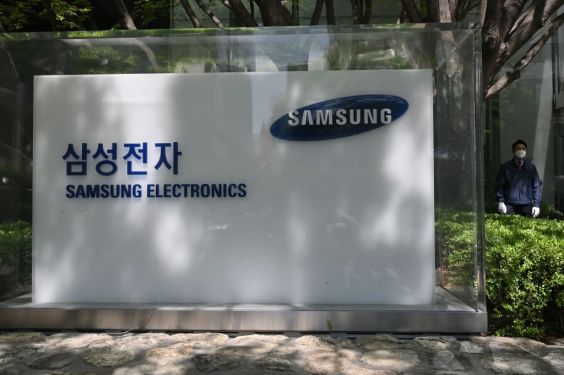 The logo of Samsung Electronics is seen outside the company's Seocho building in Seoul on May 6, 2020. (Photo by JUNG YEON-JE/AFP via Getty Images)
