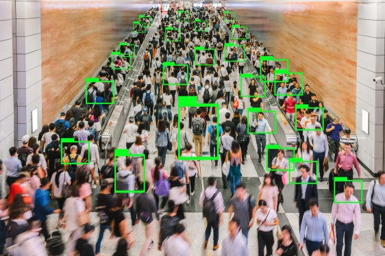 Artificial Intelligence for Deep Learning Technology over Top view scene of Motion blurred Crowd unrecognizable pedestrians walking internal subway intersection in rush hour before working hour, central Hong Kong.