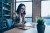 Portrait of her she nice attractive charming lovely focused brunette lady in checked shirt discussing chatting client support at industrial loft style interior work place station.