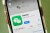In this photo illustration, the WeChat app is displayed in the App Store on an Apple iPhone.
