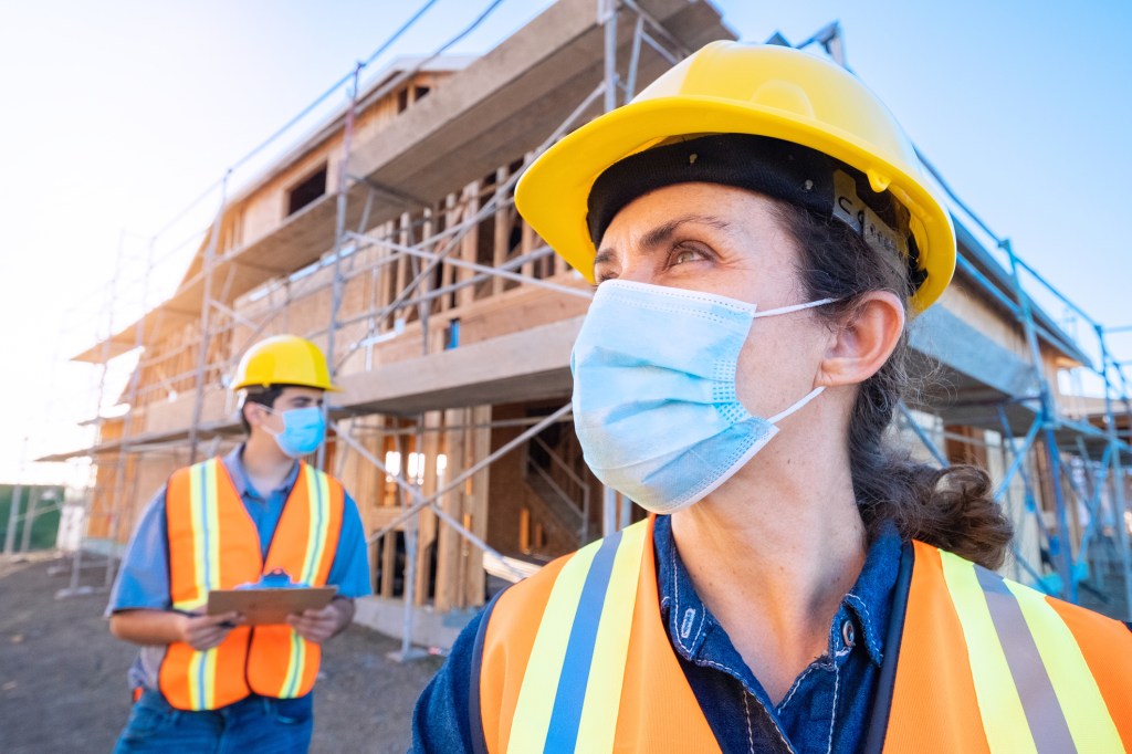masked construction worker