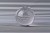 Crystal Ball Refraction Illusion on Black and White Striped Pattern.