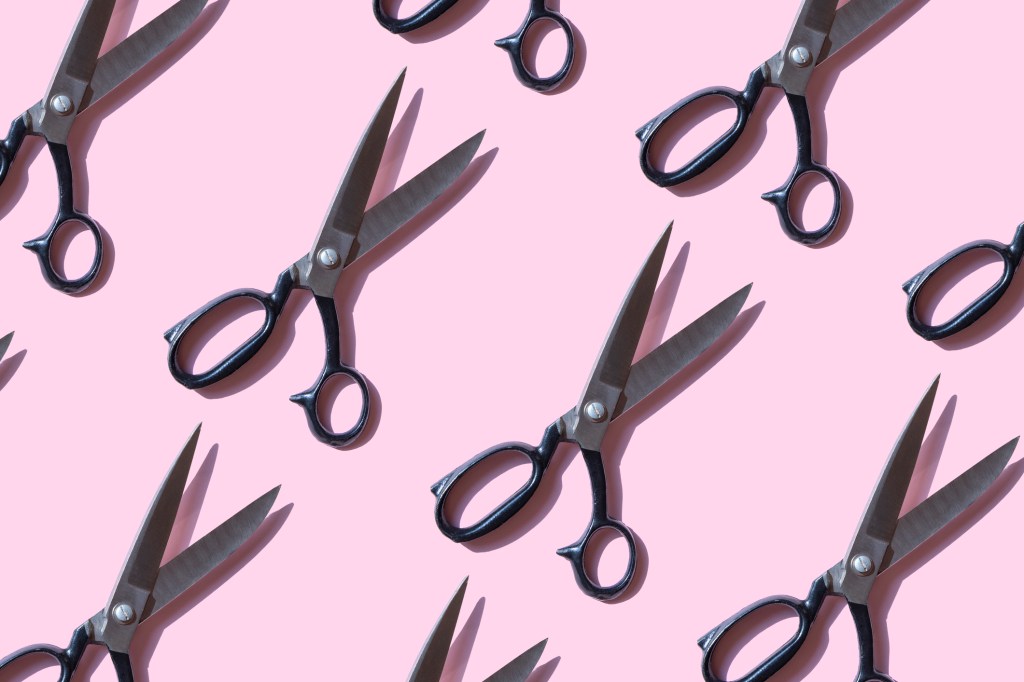 vintage scissors on pink background