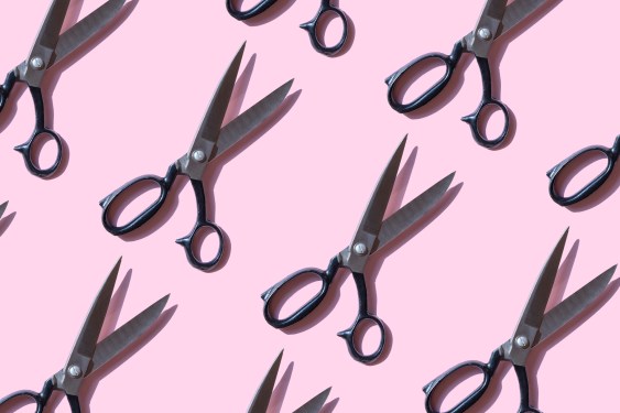 vintage scissors on pink background