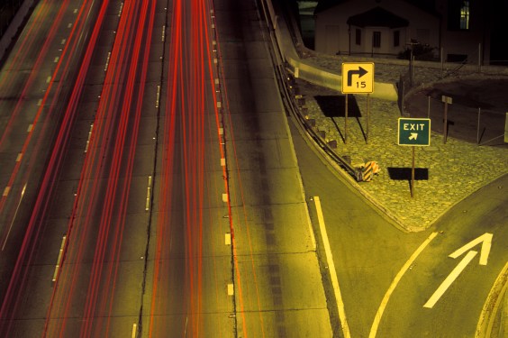 Highway exit, elevated view (blurred motion)