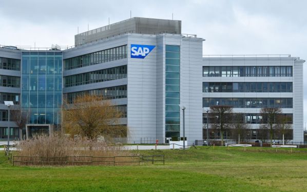 The logo of the software company SAP can be seen at its headquarters in Walldorf, Germany, 29 January 2018. The company is announcing its annual finances for the past year on the 30th of January. Photo: Uwe Anspach/dpa (Photo by Uwe Anspach/picture alliance via Getty Images)