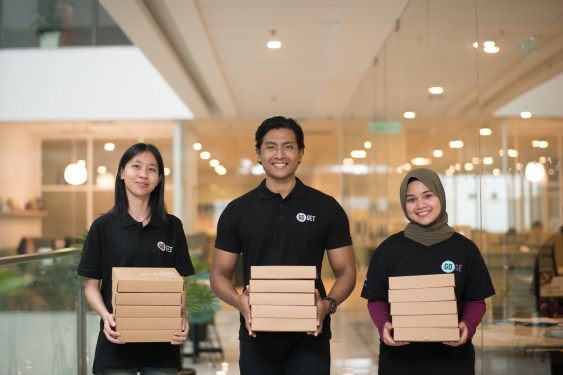 Photo of three GoGet workers