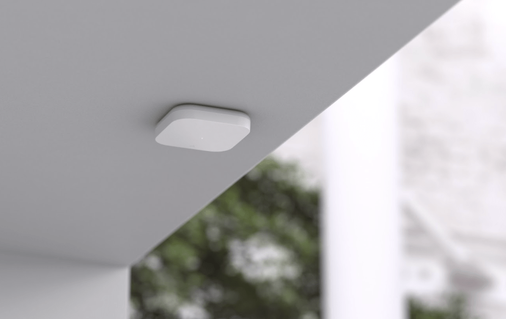 The Density Open Area sensor attached to a ceiling.