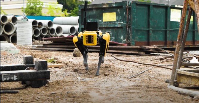 Boston Dynamics ground robot Spot transversing a job site.