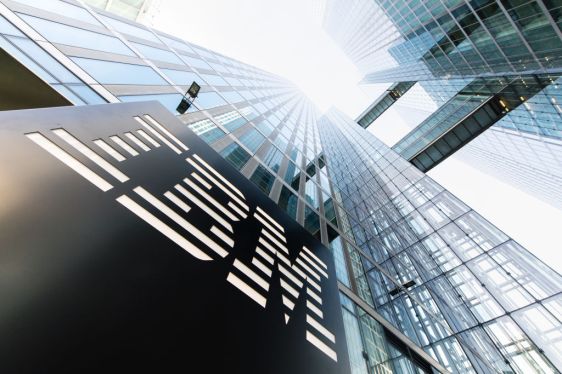 The IBM logo on the entrance to the Highlight Towers in Munich, Germany, 6 March 2017. The IT giant IBM operates its worldwide headquarters for the Watson IoT (Internet of Things) department. Photo: Matthias Balk/dpa | usage worldwide (Photo by Matthias Balk/picture alliance via Getty Images)