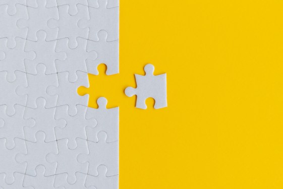 Jigsaw Puzzle on Yellow Background