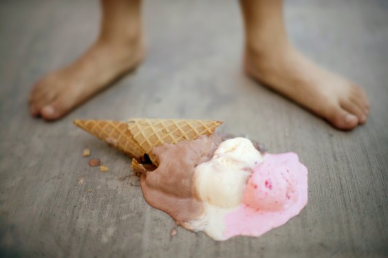 Boy Standing with Dropped Ice Cream Cone