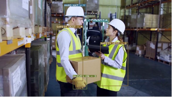 Chooch.ai data visualization identifies warehouse workers wearing safety equipment like hard hat and gloves.