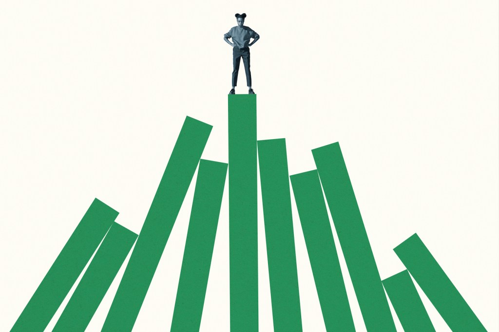 Young woman standing on top of tall green bar graph against white background