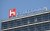The Foxconn logo is displayed on a Foxconn building in Taipei