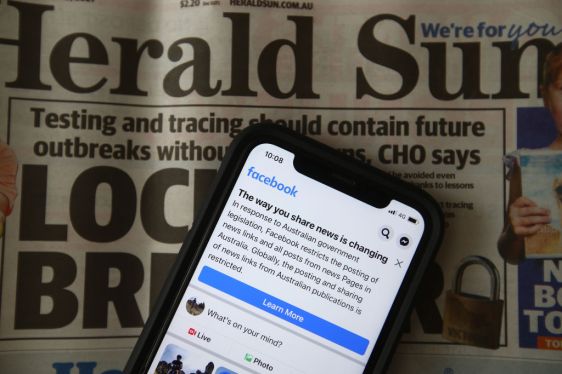 A message is seen on Facebook mobile, on February 18, 2021 in Melbourne, Australia. Facebook has banned publishers and users in Australia from posting and sharing news content as the Australian government prepares to pass laws that will require social media companies to pay news publishers for sharing or using content on their platforms.