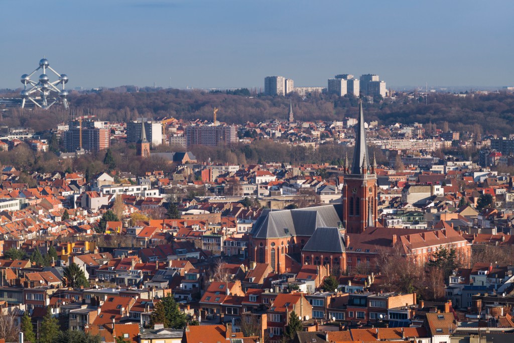 Belgium, Brussels, Koekelberg, Basilique nationale du Sacre-Coeur basilica, elevated city skyline view from the roof towards the Atomium in Heysel