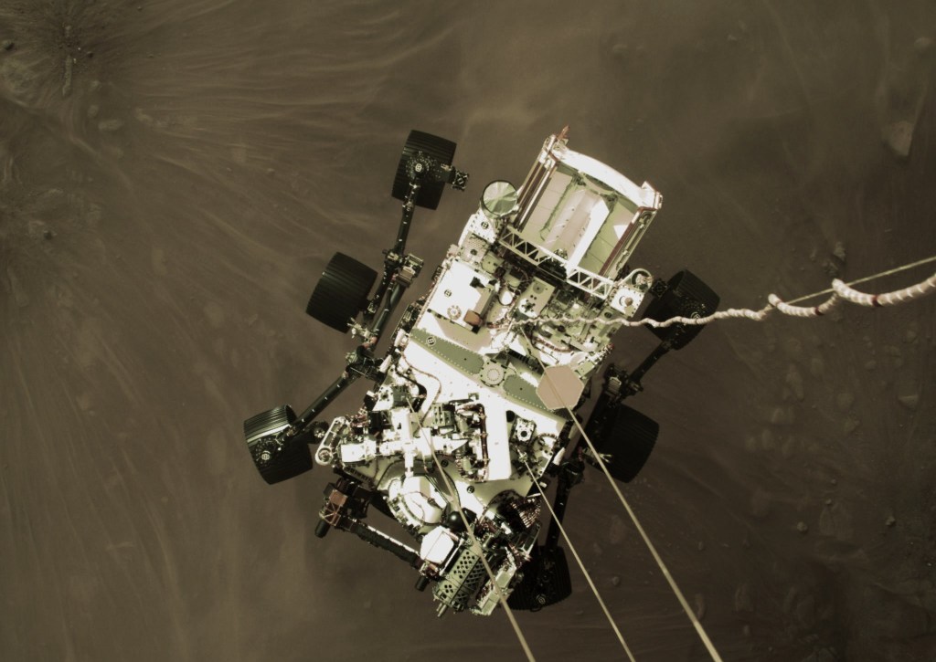 Photo taken from above the Perseverance rover as it lands on the surface of Mars.