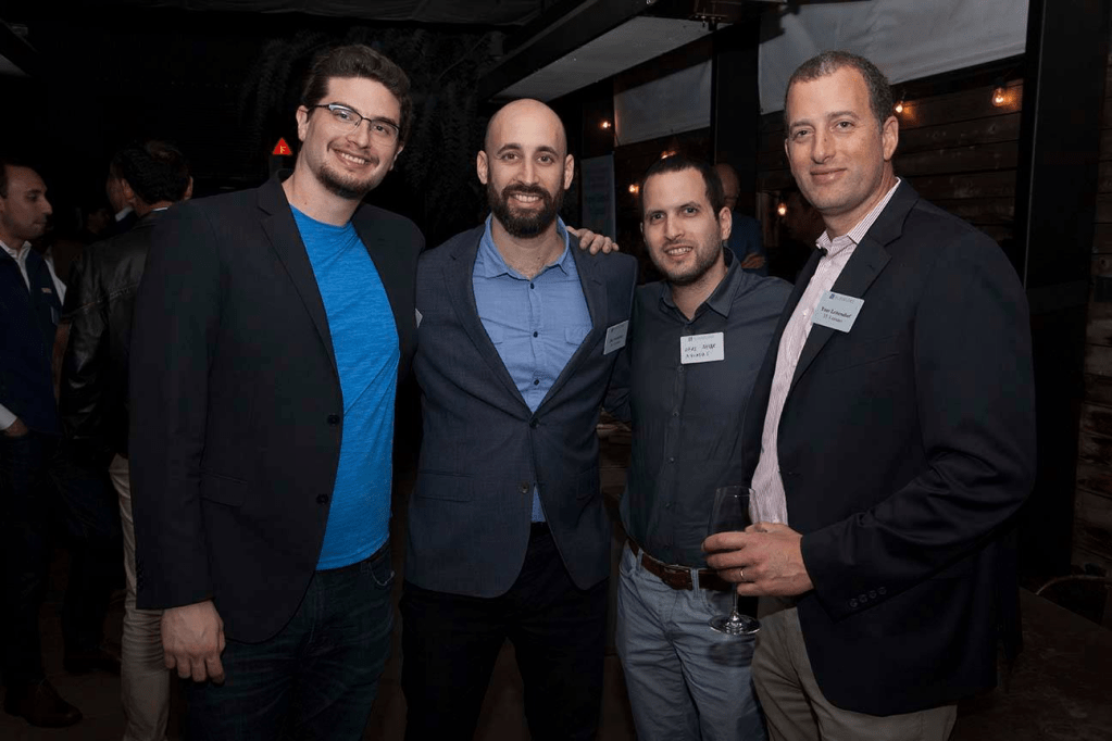 Photo of Dean Sysman (CEO & Co-founder, Axonius); Ofer Schreiber (Partner, YL Ventures); Ofri Shur (CTO & Co-Founder, Axonius); Yoav Leitersdorf (Managing Partner, YL Ventures)