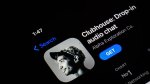 In this photo illustration, the Clubhouse app seen displayed