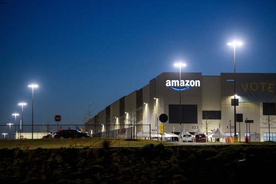 The Amazon.com, Inc. BHM1 fulfillment center is seen before sunrise on March 29, 2021 in Bessemer, Alabama.