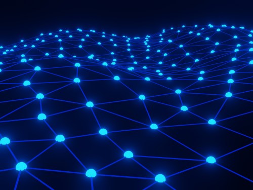 Dots representing blockchain nodes connected together in network on a black background.
