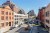 Image of cars turning onto a street in New York City.