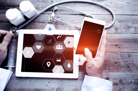 Medicine doctor hand working with modern computer interface as medical network concept