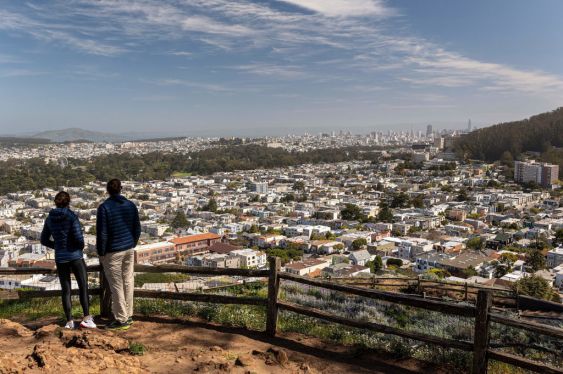 People look out over residential housing in San Francisco, California, U.S., on Friday, April 9, 2021. U.S. property taxes increased at the fastest pace for four years in 2020, with some of the steepest increases coming in traditionally low-cost Sun Belt states, according to figures from ATTOM Data Solutions. Photographer: David Paul Morris/Bloomberg via Getty Images