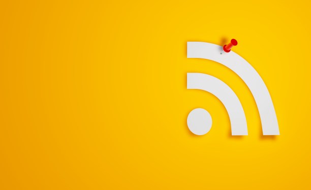Pin Paper RSS Symbol on Yellow Background
