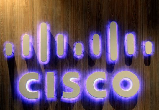 The logo of the US computer company Cisco Systems is displayed during the 4th edition of the Viva Technology show at Parc des Expositions Porte de Versailles on May 17, 2019 in Paris, France. Viva Technology, the new international event brings together 9000 startups with top investors, companies to grow businesses and all players in the digital transformation who shape the future of the internet.